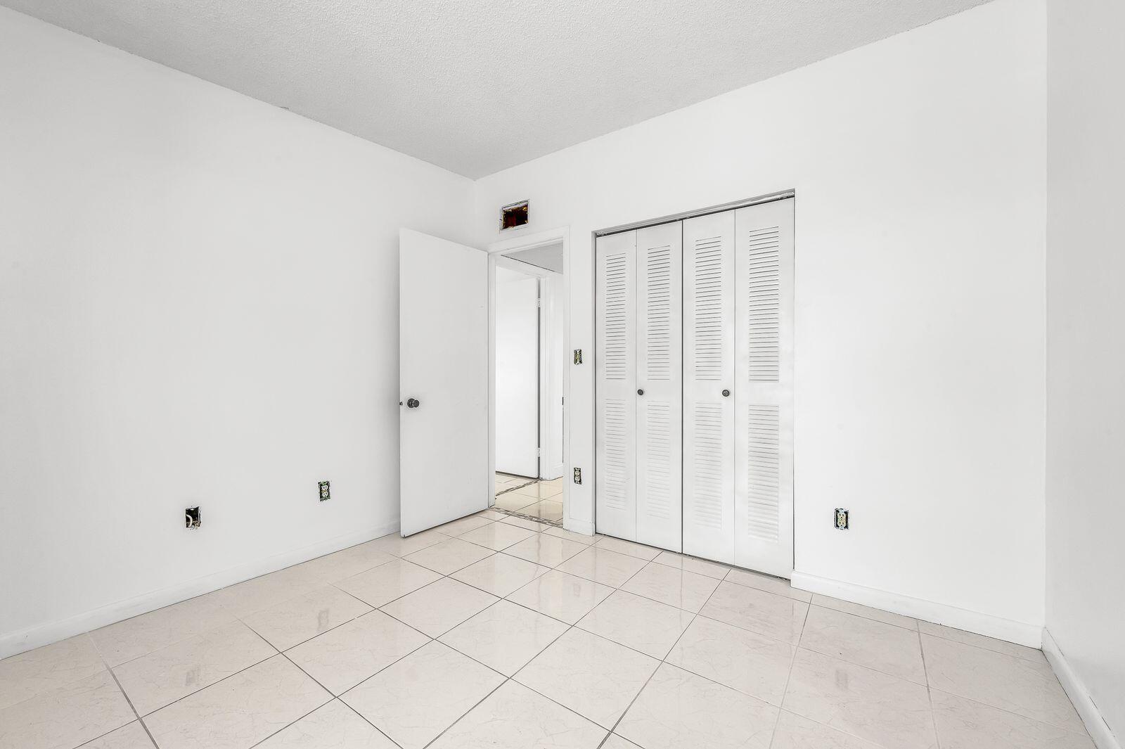 TAMARAC GARDENS CONDOMINI - Residential Lease