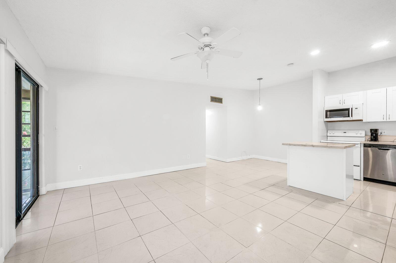 TAMARAC GARDENS CONDOMINI - Residential Lease