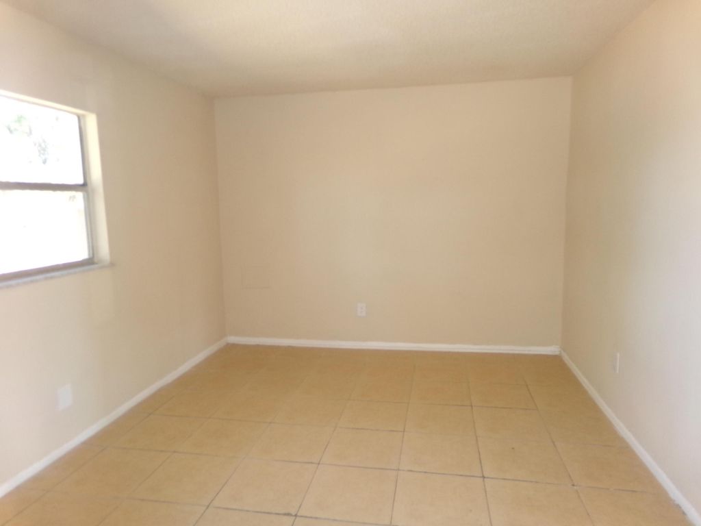 Photo of 3106 Langston Drive, Fort Pierce, FL 34946 (MLS # R11162130)