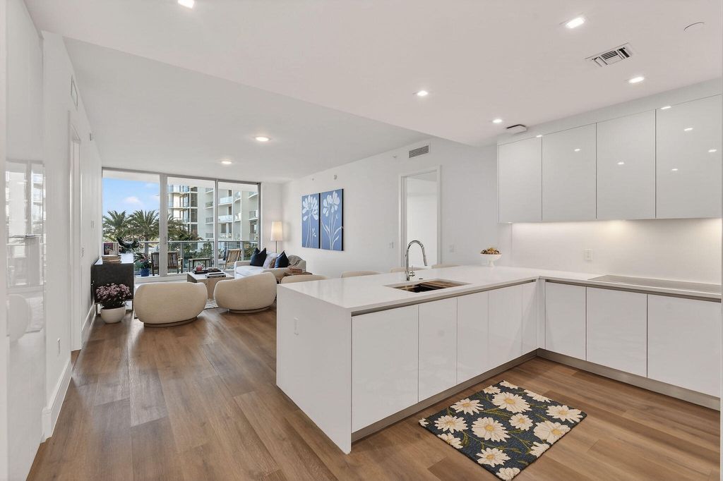 Photo of 220 Lake Shore Drive #715, Lake Park, FL 33403 (MLS # B26019204)