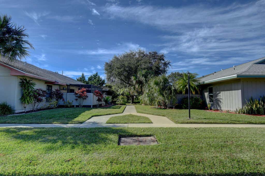 Photo of 4089 NW Cinnamon Tree Circle, Jensen Beach, FL 34957 (MLS # R10941827)