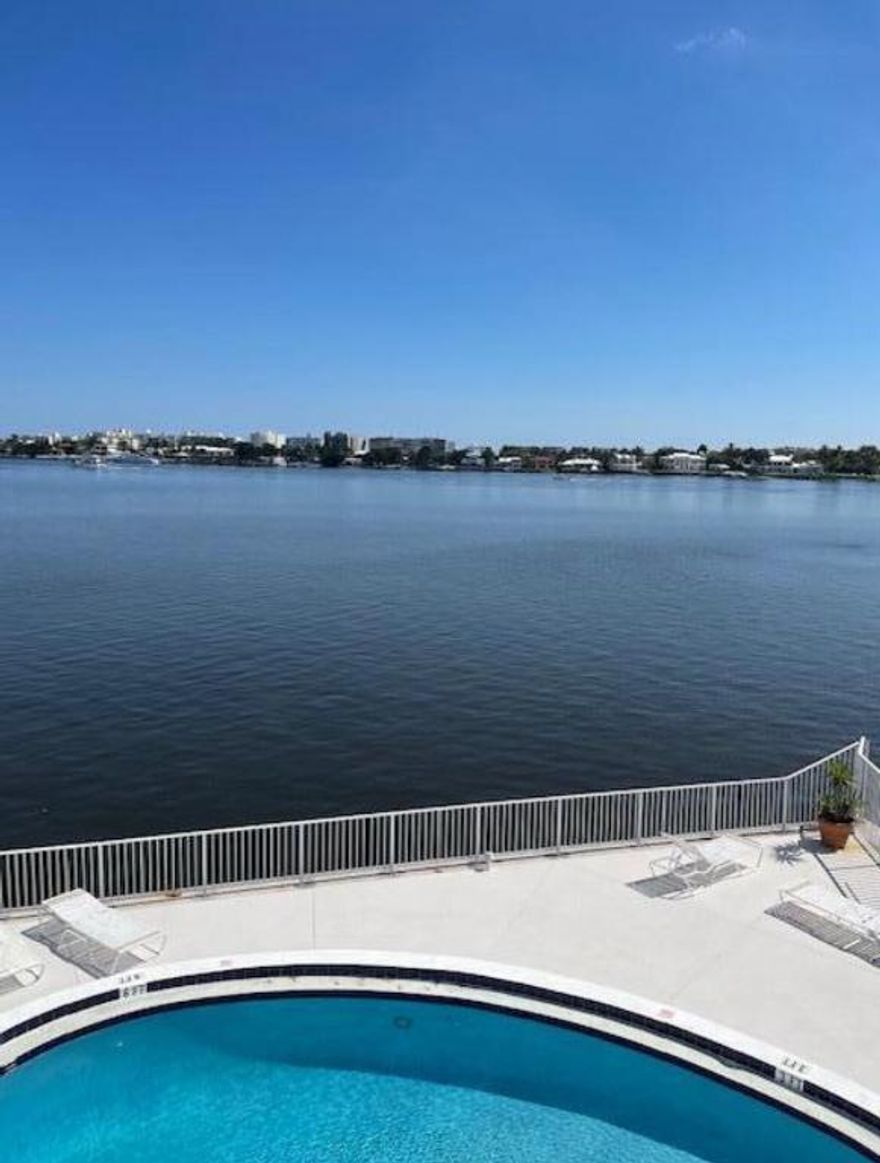 Spacious 1-bedroom, 1-bath condo for sale in the heart of Lantana, offering million-dollar direct Intracoastal views at a great price. Perched on the 3rd floor, this bright and airy residence features a private balcony overlooking, the Lantana Bridge, and the stunning estates of Hypoluxo Island. Large impact windows fill the condo with natural light while providing peace of mind, and the secure lobby entry adds an extra layer of comfort. The community offers a sparkling pool with a spacious pool deck area, along with the convenience of on-site laundry and a fair HOA. Owners may rent immediately, making this property ideal as a primary home, seasonal getaway, or investment opportunity. Perfectly located just minutes from the beach, waterfront dining, shops & coastal living of South Florida