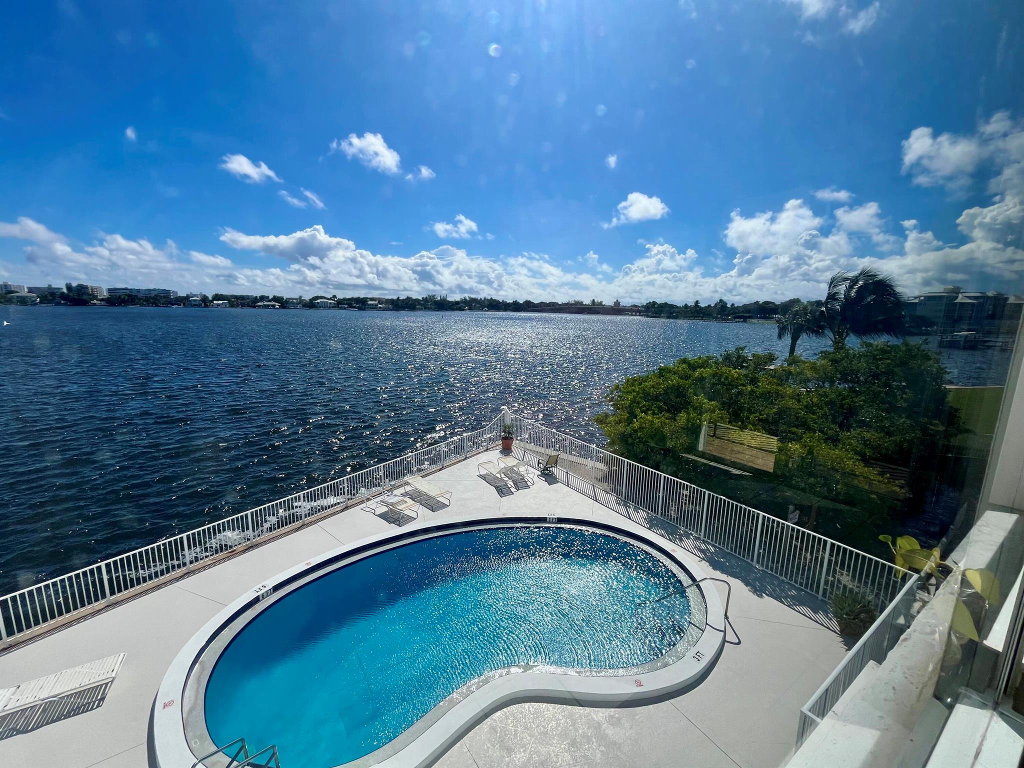 Spacious 1-bedroom, 1-bath condo for sale in the heart of Lantana, offering million-dollar direct Intracoastal views at a great price. Perched on the 3rd floor, this bright and airy residence features a private balcony overlooking, the Lantana Bridge, and the stunning estates of Hypoluxo Island. Large impact windows fill the condo with natural light while providing peace of mind, and the secure lobby entry adds an extra layer of comfort. The community offers a sparkling pool with a spacious pool deck area, along with the convenience of on-site laundry and a fair HOA. Owners may rent immediately, making this property ideal as a primary home, seasonal getaway, or investment opportunity. Perfectly located just minutes from the beach, waterfront dining, shops & coastal living of South Florida