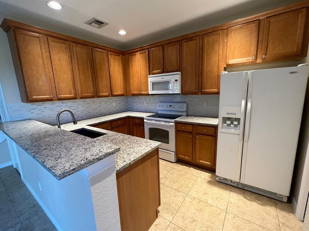 Beautiful Renovated 3/2.5 Single Family, Kitchen with Granite counters and Backsplash, Great Master Bedroom with Walk In Closet and Great Master Bathroom with Separate Shower and Family Tub, double sink, Newer Lighting Fixtures/Fans, 2 Detached Car Garage, Quiet and peacefully neighborhood, close to the Beach in a great area! Hurry Wont Last!