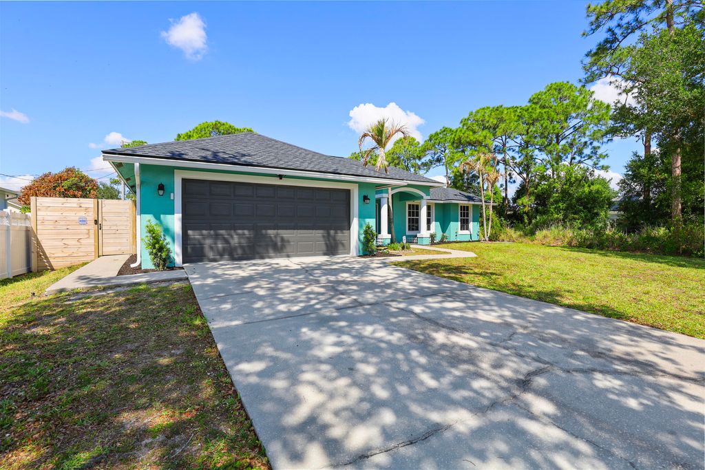 Photo of 3674 SW Margela Street, Port Saint Lucie, FL 34953 (MLS # B26022976)