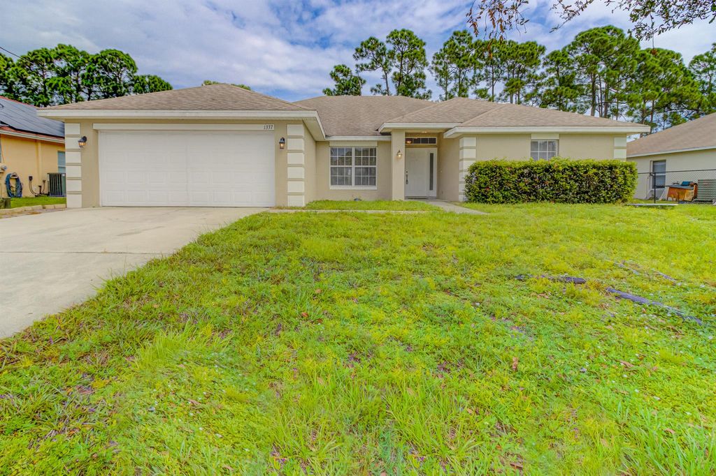 Photo of 1337 SW Ingrassina Avenue, Port St Lucie, FL 34953 (MLS # R10914408)