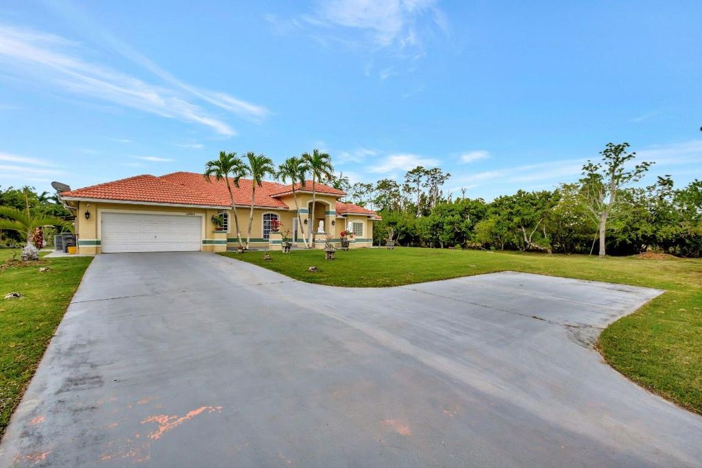Photo of 12402 83rd Lane N, The Acreage, FL 33412 (MLS # R11158801)