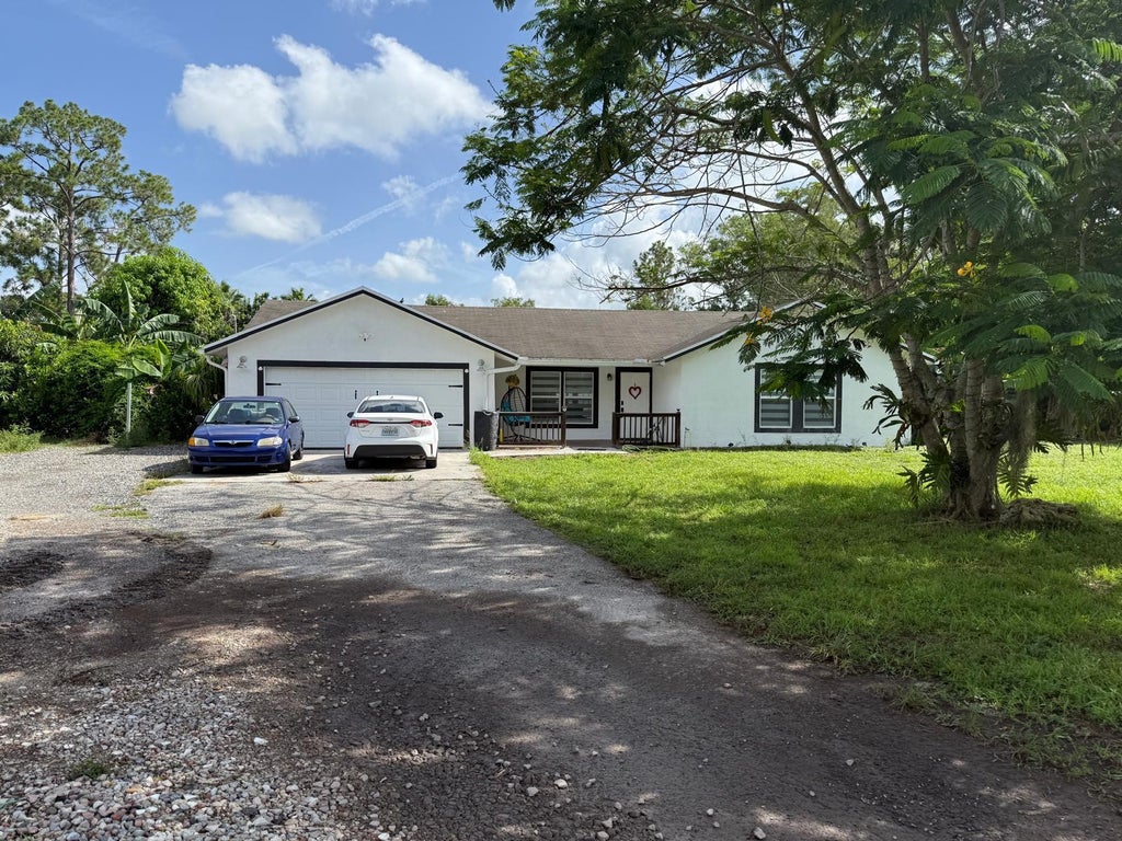 Photo of 16393 E LANCASHIRE Drive E, The Acreage, FL 33470 (MLS # B26055942)
