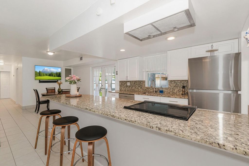 Photo of 6307 NW 71 St Avenue, Tamarac, FL 33321 (MLS # R11163178)