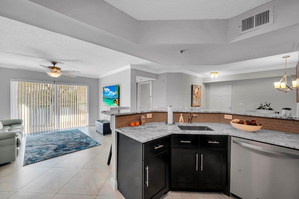 Photo of 3756 NW Mediterranean Lane #210, Jensen Beach, FL 34957 (MLS # F10427903)