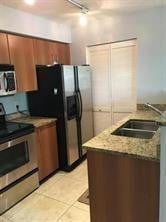 Photo of 1125 CRYSTAL Way #E, Delray Beach, FL 33444 (MLS # B26071276)