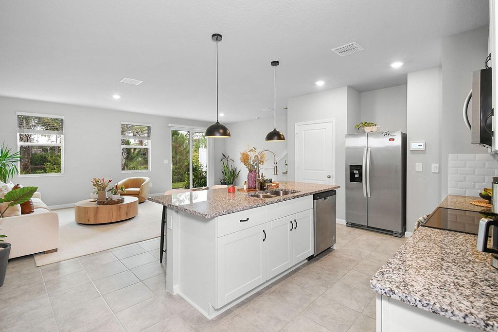 Photo of 5766 SE Edgewater Circle, Stuart, FL 34997 (MLS # R11122585)