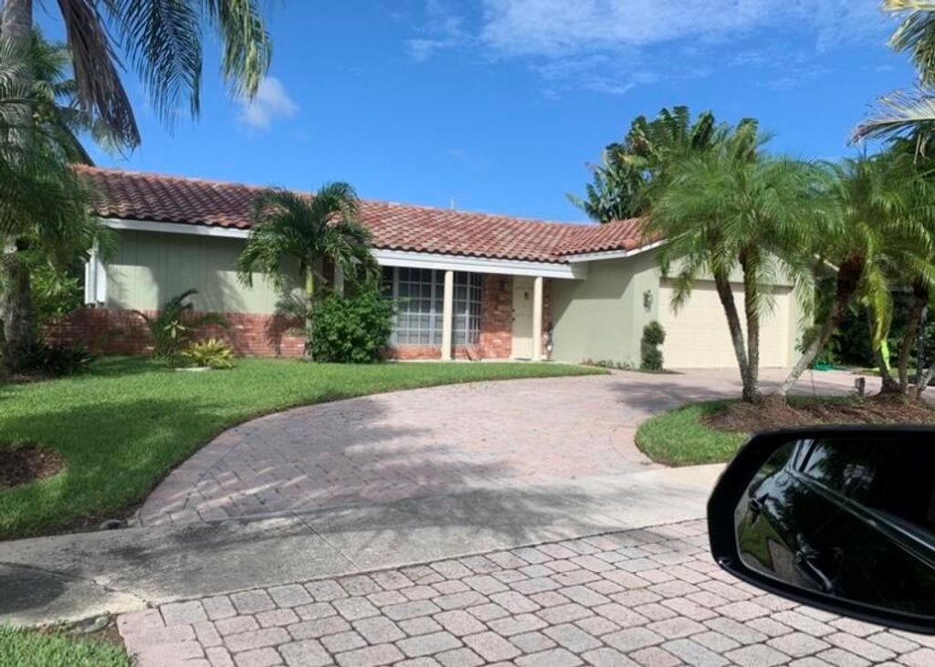 Photo of 1051 SW 12th Terrace, Boca Raton, FL 33486 (MLS # R10775621)