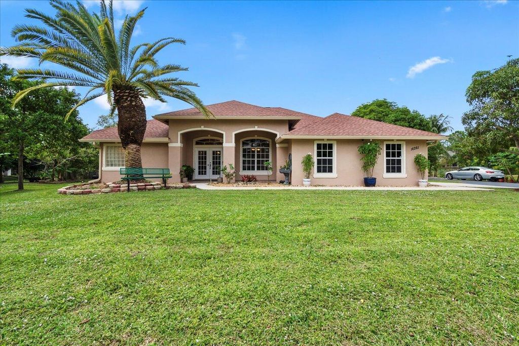 Photo of 16261 Hamlin Boulevard, The Acreage, FL 33470 (MLS # R10937774)