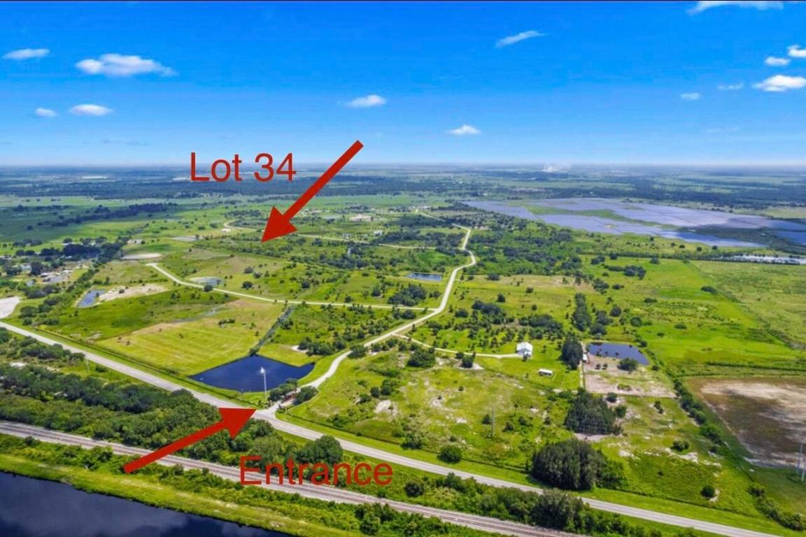 SHERMAN WOOD RANCHES - Land