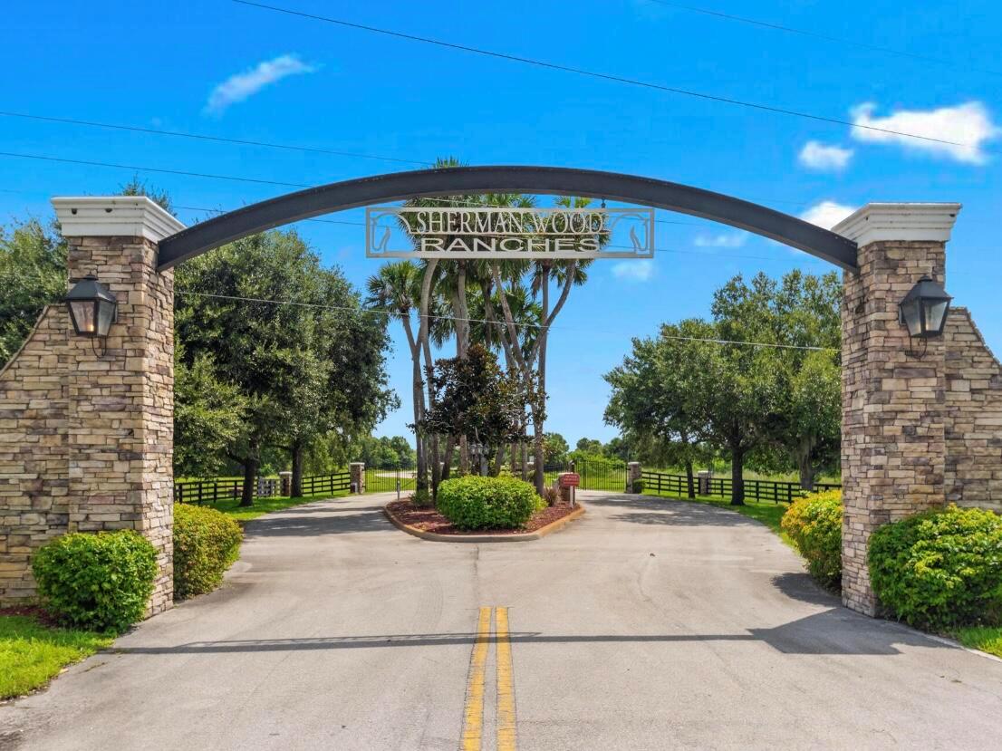 SHERMAN WOOD RANCHES - Land