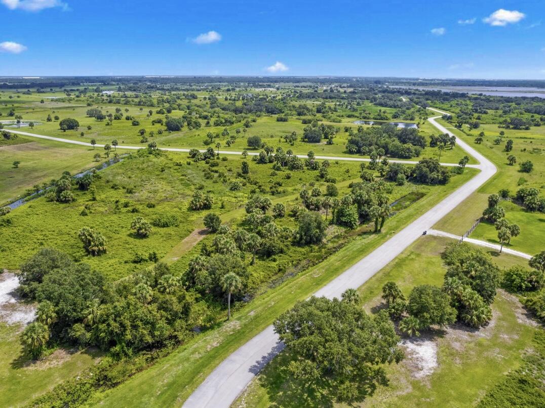 SHERMAN WOOD RANCHES - Land
