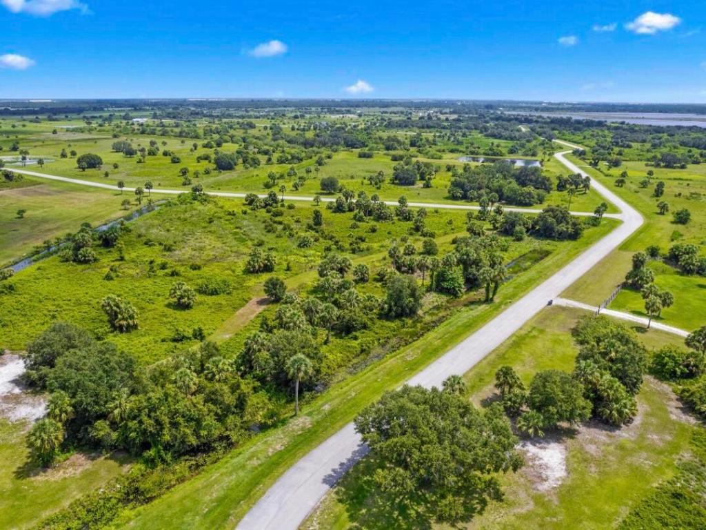 SHERMAN WOOD RANCHES - Land