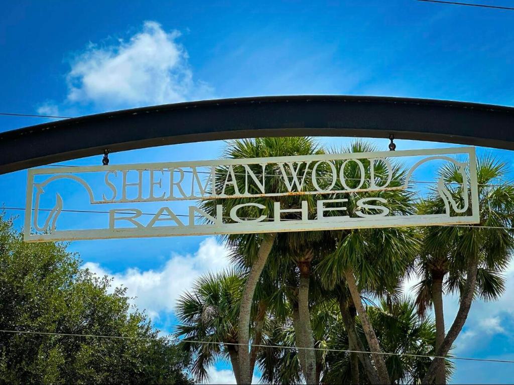 SHERMAN WOOD RANCHES - Land