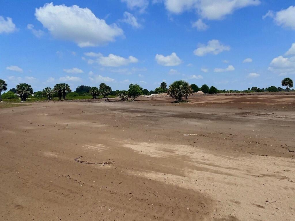 SHERMAN WOOD RANCHES - Land