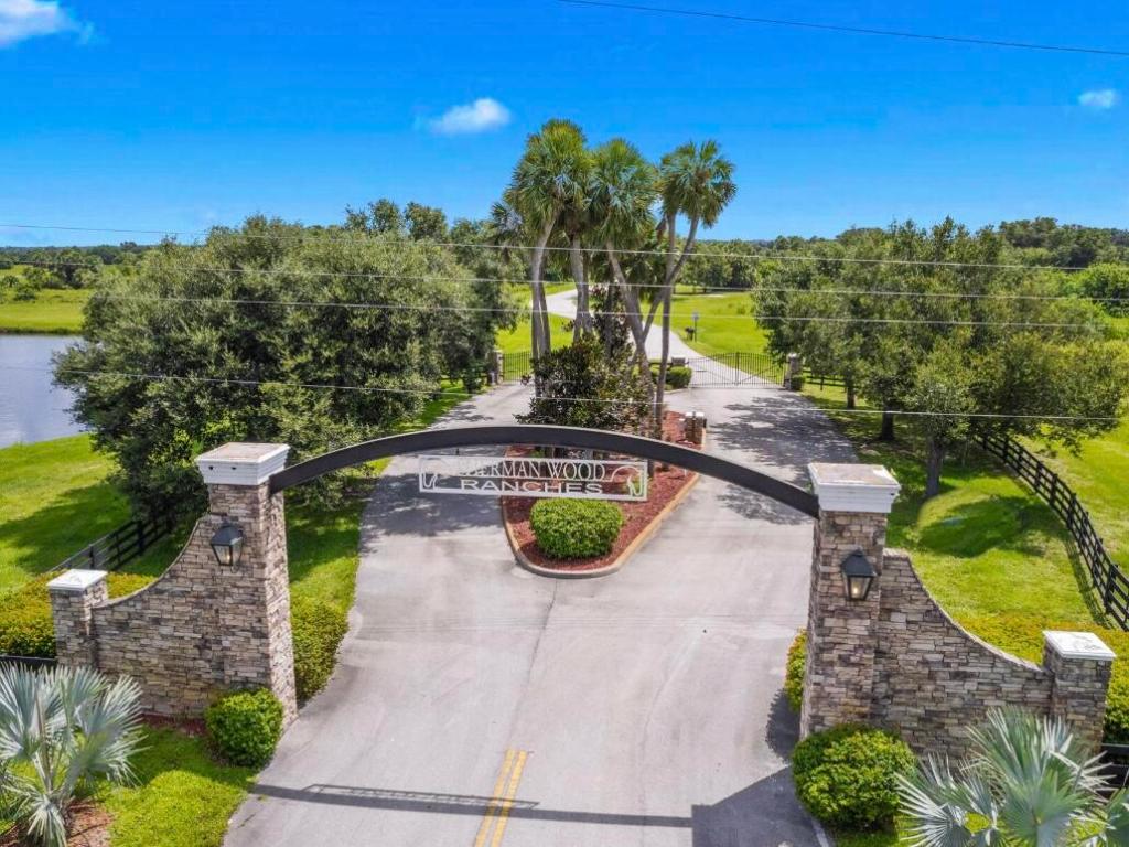 SHERMAN WOOD RANCHES - Land