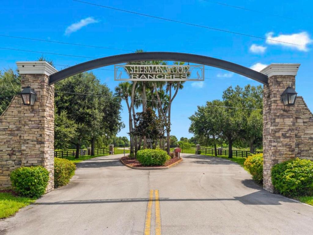 SHERMAN WOOD RANCHES - Land