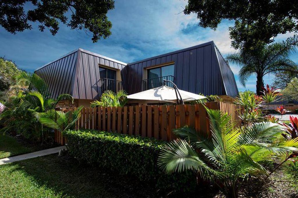 Photo of 5686 SE Windsong Lane, Stuart, FL 34997 (MLS # R10759270)