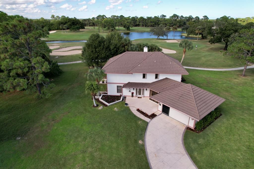 Photo of 9604 Knollwood Lane Ln, Fort Pierce, FL 34951 (MLS # R10756739)