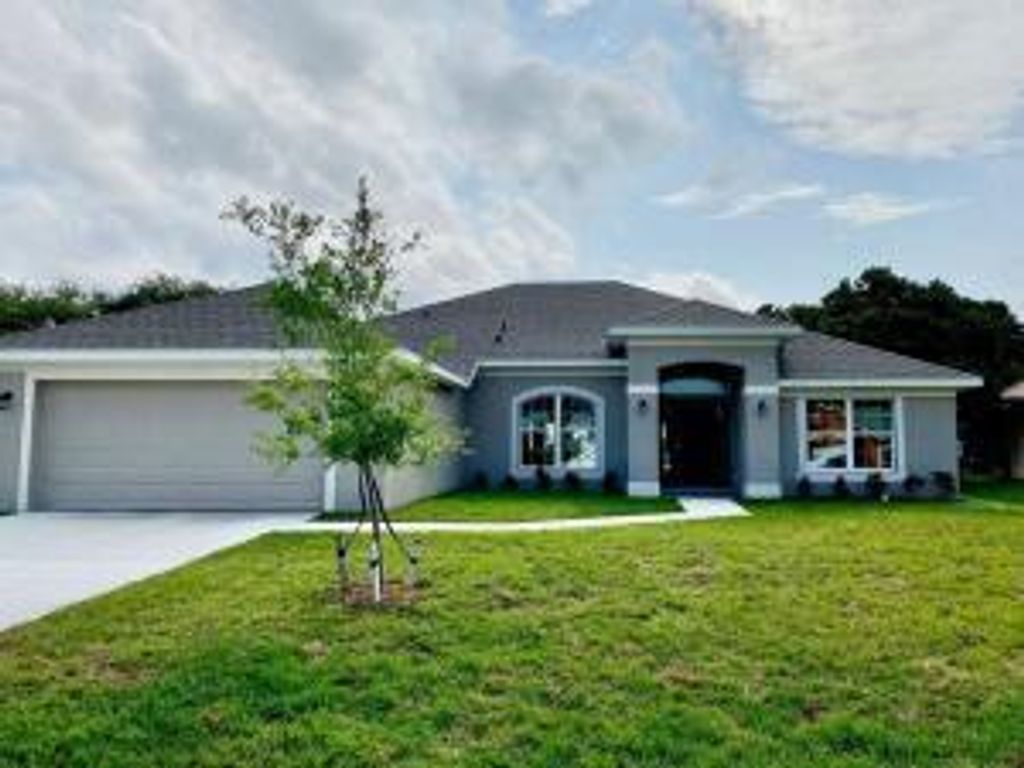 Photo of 6775 NW Abigail Avenue, Port St Lucie, FL 34983 (MLS # R10875450)