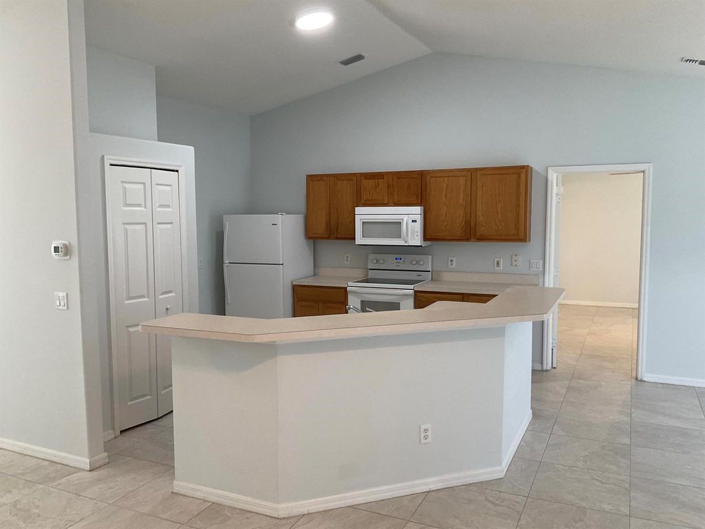 Photo of 433 SW Prater Avenue, Port Saint Lucie, FL 34953 (MLS # R11000526)