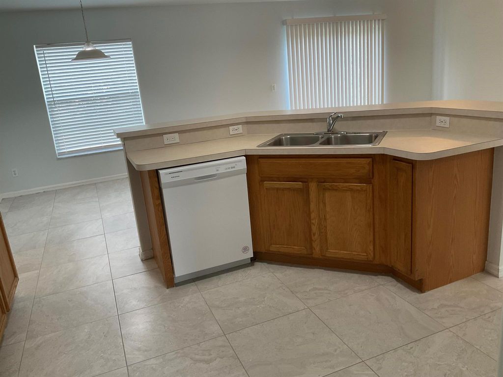 Photo of 433 SW Prater Avenue, Port Saint Lucie, FL 34953 (MLS # R11000526)