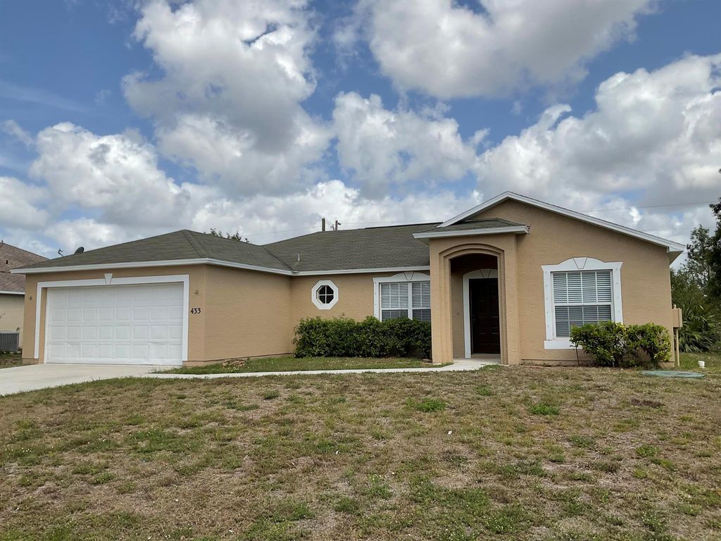 Photo of 433 SW Prater Avenue, Port Saint Lucie, FL 34953 (MLS # R11000526)