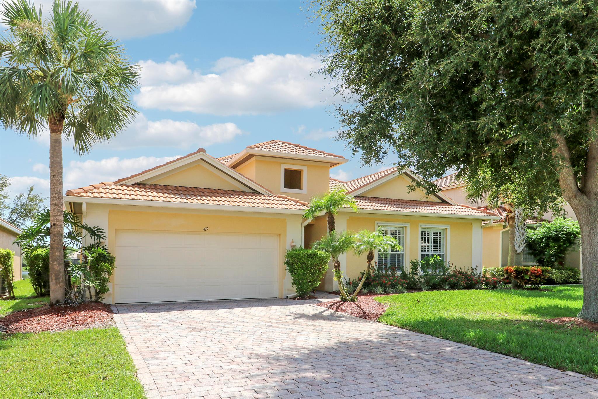 Beautiful and spacious single family home located in the highly sought-after golf community of St. James. This home has been meticulously maintained and thoughtfully designed with the best builder upgrades, high-end porcelain Italian tile, souring ceilings, plantation shutters, a new refrigerator and dishwasher. The back yard features a gorgeous waterfront view and ample sized screened-in patio. No membership fee required! Plenty of space for everyone with a total of four bedrooms, two bathrooms, and a large family room just off the open kitchen. The HOA includes a resort-style pool, lawn care, cable, high-speed internet, tennis, basketball, playground, fitness center, and an exquisitely designed golf course by Warren Harrison. Optional membership available. Bathrooms are equipped with