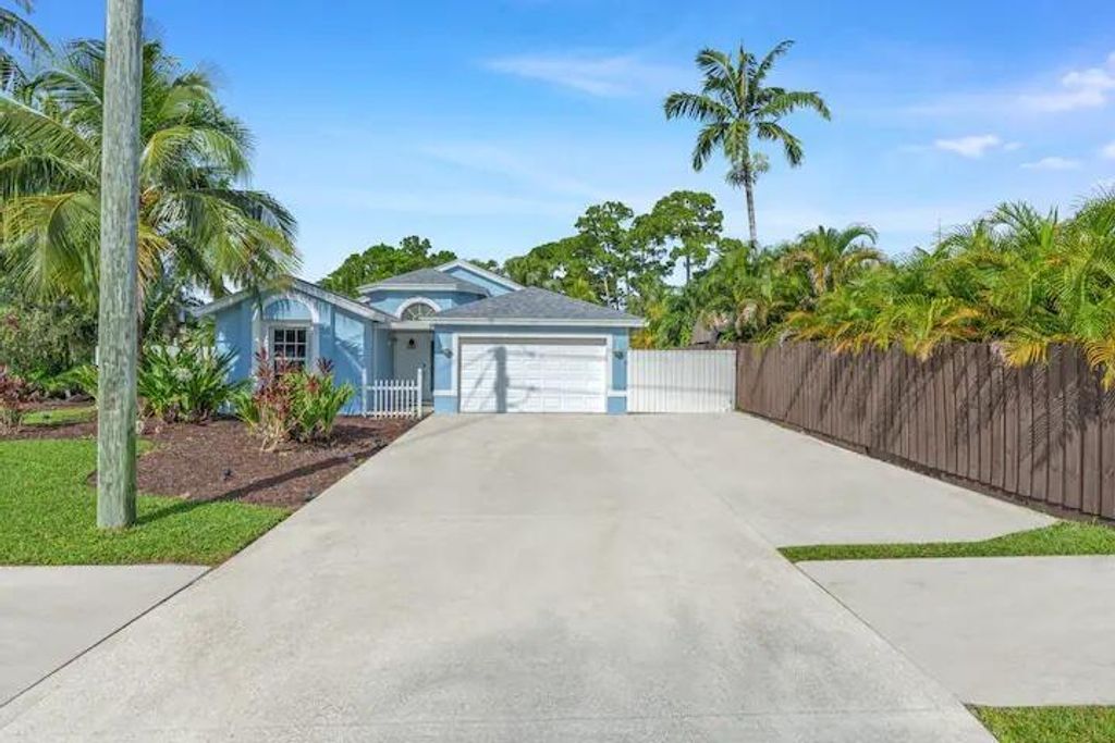 Photo of 14991 Harriet Avenue, Jupiter, FL 33458 (MLS # R10980434)