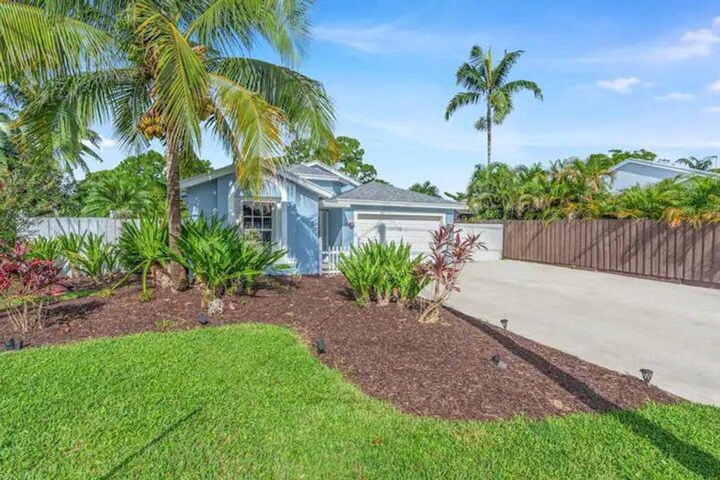 Photo of 14991 Harriet Avenue, Jupiter, FL 33458 (MLS # R10980434)