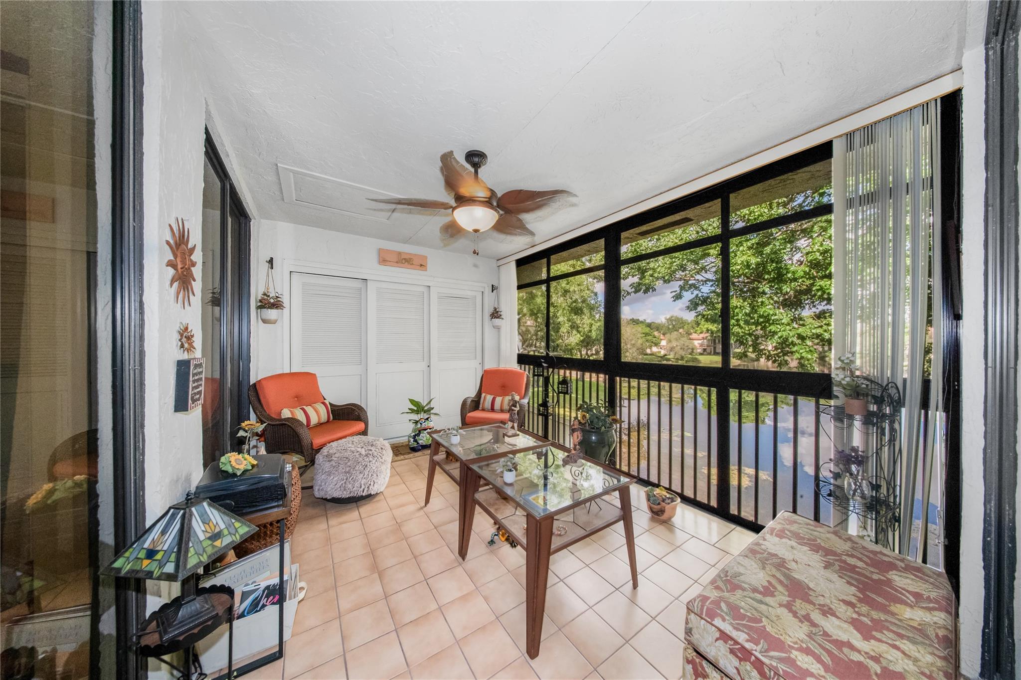 Stunning water views from the moment you step into this beautiful well maintained 3 bedroom 2 bathroom condo. Featuring a split bedroom plan, eat in kitchen, and a spacious living room and dining area. A large Florida room overlooks the water and adds an extra room. Amazing views from almost every room. No carpet! Perfect layout for entertaining or just relaxing and enjoying the view. Lots of storage. Community pool close by! Beautiful tropical landscaping. The Township is a popular place to call home, close to the Promenade, shopping, highways, and transportation! Lots of amenities to enjoy! All Ages Community.