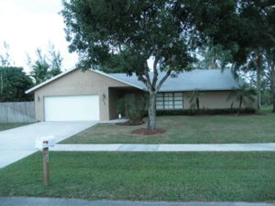 Pool Home with over 2000 square feet of living space, where you can walk to the park and school. Split-plan with Hardwood Floors in living area, family room, vaulted ceilings, large privacy fenced yard with screened patio, with pool and lawn service included.