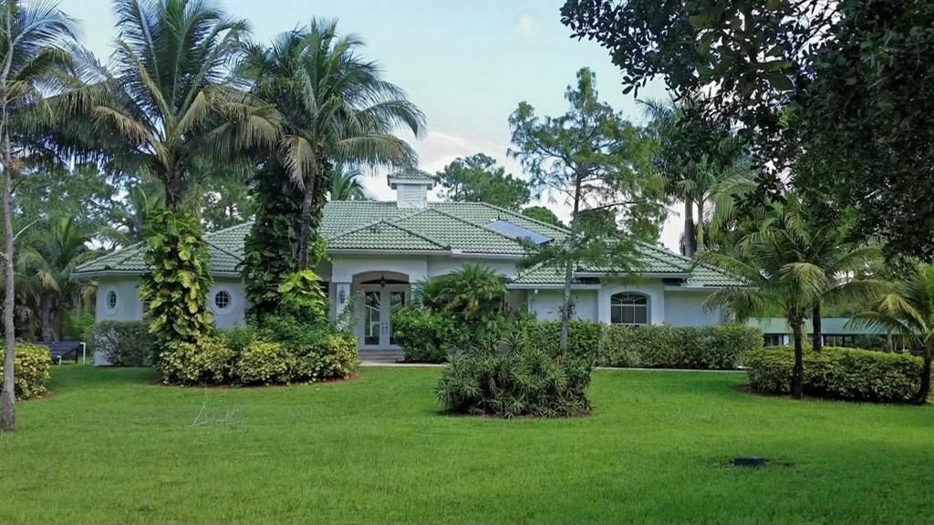 Photo of 12863 Mallard Creek Drive, Palm Beach Gardens, FL 33418 (MLS # R10688022)