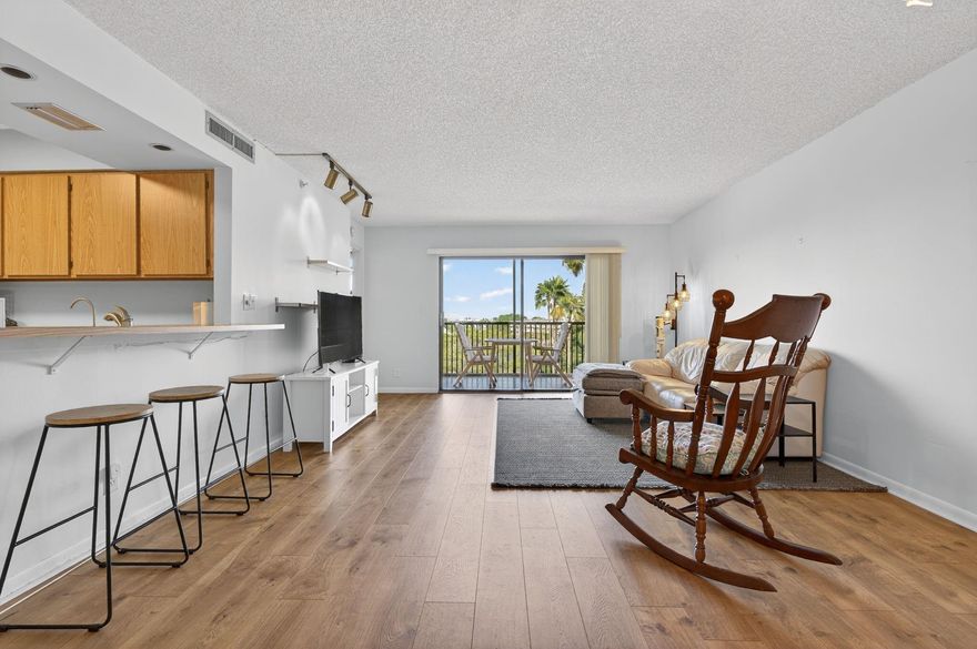 WHAT A VIEW! This 6th floor gem in the coveted “04” line at Le Club at Cypress Bend is your front-row seat to lakefront serenity. Sip coffee on your private balcony as wildlife dances across the water. Inside, enjoy an open layout with impact windows, wood-look floors, washer/dryer, and a galley kitchen. The oversized primary suite features a large walk-in closet plus a bonus nook—perfect for a desk, reading corner, or yoga mat—with stunning views of the pool, garden, and lake. Resort-style amenities include 2 heated pools, clubhouse, trails, pickleball, gym, sauna, grill stations, and more. Walk to The Pomp, Topgolf, Harrah’s Casino, dining, shopping & luxury hotels. Love where you live.