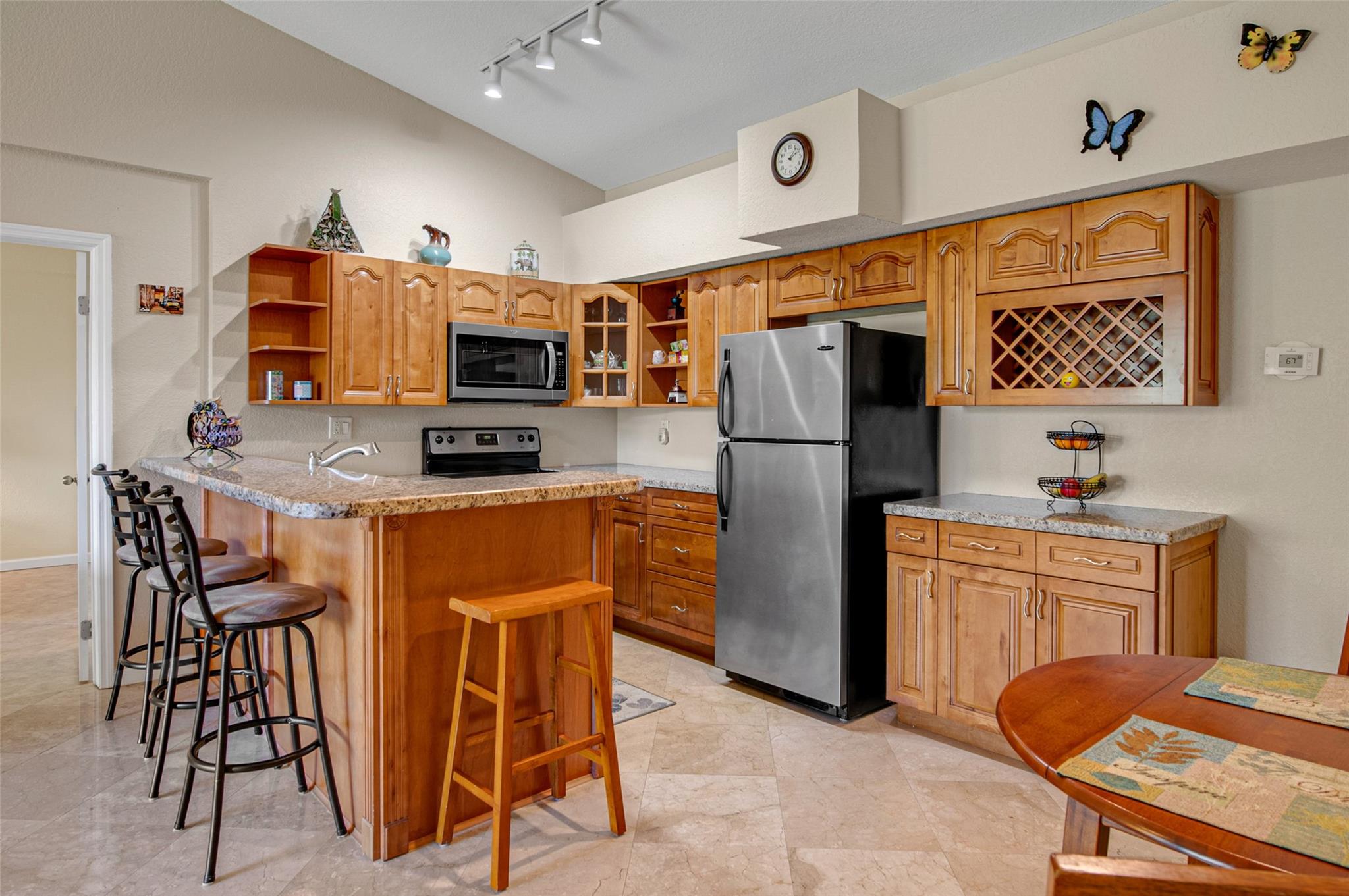 INVESTORS DREAM - RENT RIGHT AWAY!! BEAUTIFUL SPACIOUS AND UPDATED 2BR/2BA IN COCONUT CREEK. THIS WELL MAINTAINED UNIT OFFERS OPEN CONCEPT KITCHEN WITH GRANITE COUNTERTOPS AND S/S APPLIANCES. NICELY UPDATED 2ND STORY UNIT FEATURING MARBLE FLOORS, VAULTED CEILINGS, UPDATED BATHROOMS AND FULL SIZE WASHER/DRYER. ENJOY PEACEFUL GREEN VIEWS FROM YOUR PRIVATE BALCONY, WHICH ALSO INCLUDES ADDITIONAL STORAGE ROOM. MASTER BEDROOM OFFERS PLENTY OF CLOSET SPACE. LOCATED IN RESORT STYLE COMMUNITY, AMENITIES INCLUDE: VOLLEYBALL COURTS, FITNESS CENTER, SWIMMING POOL, BBQ AREA AND CLUBHOUSE. GREAT FOR INVESTORS OR FAMILIES. PETS ARE OK. IDEAL LOCATION CLOSE TO SHOPPING AND MAJOR HIGHWAYS. WALKING DISTANCE TO PUBLIX, WALGREENS AND SPROUTS!