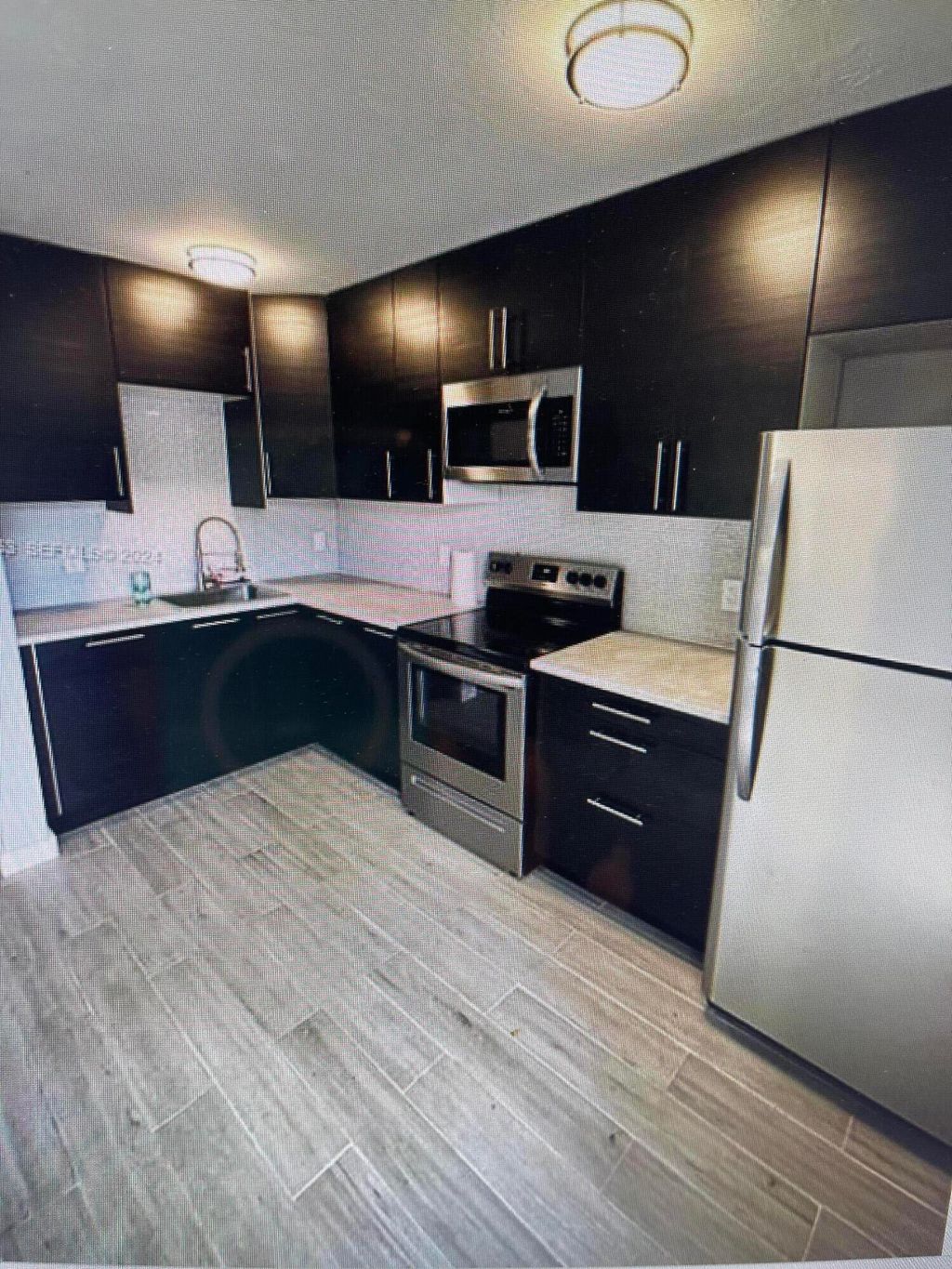 Photo of 1329 NE 5th Avenue #4, Fort Lauderdale, FL 33304 (MLS # B26032114)