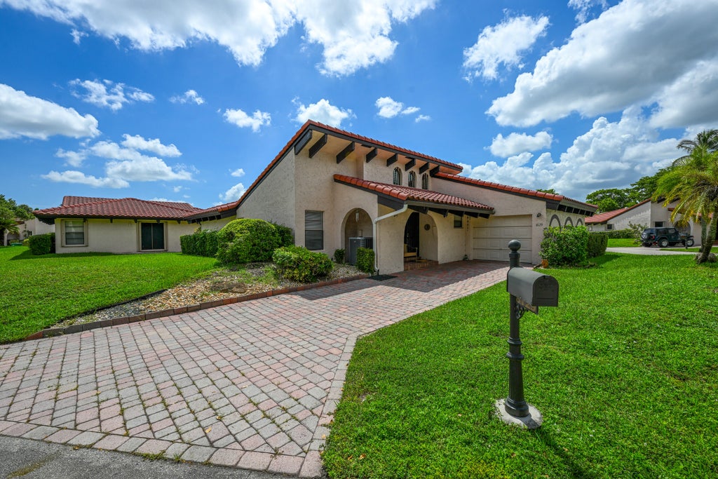 Photo of 8129 PINE Circle #33, Tamarac, FL 33321 (MLS # B26079256)