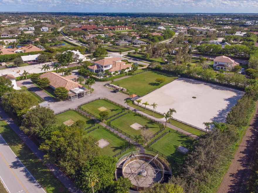 Location, Location, Location! Saddle Trail at its best. This 4.1 acre equestrian estate has direct bridle path access to the horse show. It has it all starting with an elegant 5 bedroom  (all ensuite) home ready for you to move into. High ceilings, chefs kitchen, impact glass and  three (3) different living areas for multi generational living. Expansive outdoor living area with a new pool perfect for entertaining or just relaxation.

The property is graced with a 15 stall center aisle barn complete with 5 wash/grooming stalls, 2 tack rooms, office, laundry, bath, feed & hay storage, fly spray system, roll down doors at all entrances and a one (1) bedroom apartment. The property is complimented by a 160' X 210' arena,  115' X 140' grass jump field, 6 horse Kraft walker and 6  large paddoc paddoc