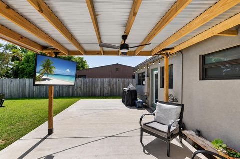 Tiny photo for 110 NW 56th Street, Oakland Park, FL 33309 (MLS # B26054301)