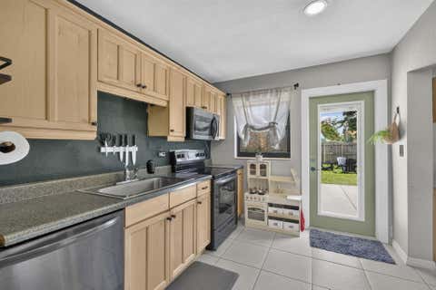 Tiny photo for 110 NW 56th Street, Oakland Park, FL 33309 (MLS # B26054301)