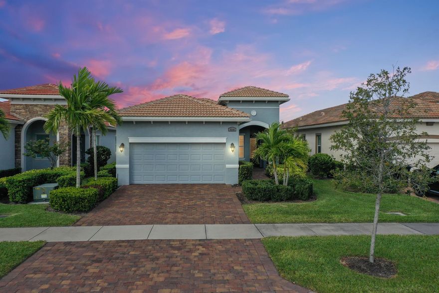 This lakefront 2/2/2 with den home is located in beautiful gated PGA Verano, where resort style living is at its finest. Built in 2021, an open floor plan with $80K in upgrades. Wood look tile through out, kitchen has quartz counters, upgraded appliances, 42'' wood cabinets, plenty of space, accented with crown molding, sizeable pantry. Built-In wine cooler. Impact windows through out. Sit back and relax in your screened patio overlooking the water view and sunset..
Resort living with plenty to do. Tennis, pickleball, swimming, fitness center, smart fit training center, miles of biking, walking trails. 5 minutes from Traditions, 45 minutes from Palm Beach Int. Airport, less than 2 hours to Orlando Airport. Close to I-95 and turnpike. Close to shopping, fine dining, golf, beach. Master Bath Shower has extra reinforcement to secure grab bars.
Front door entrance has no steps, easy wheelchair access.