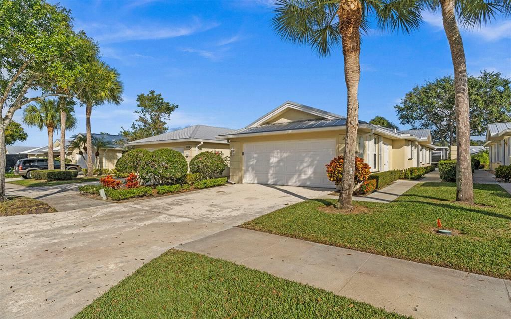 Photo of 1606 SW Waterfall Boulevard, Palm City, FL 34990 (MLS # R10764809)
