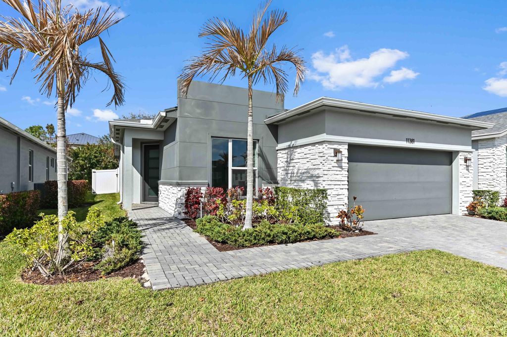 Photo of 11381 SW Lyra Drive, Port Saint Lucie, FL 34987 (MLS # B26021601)