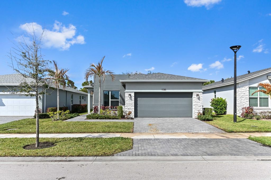 Photo of 11381 SW Lyra Drive, Port Saint Lucie, FL 34987 (MLS # B26021601)