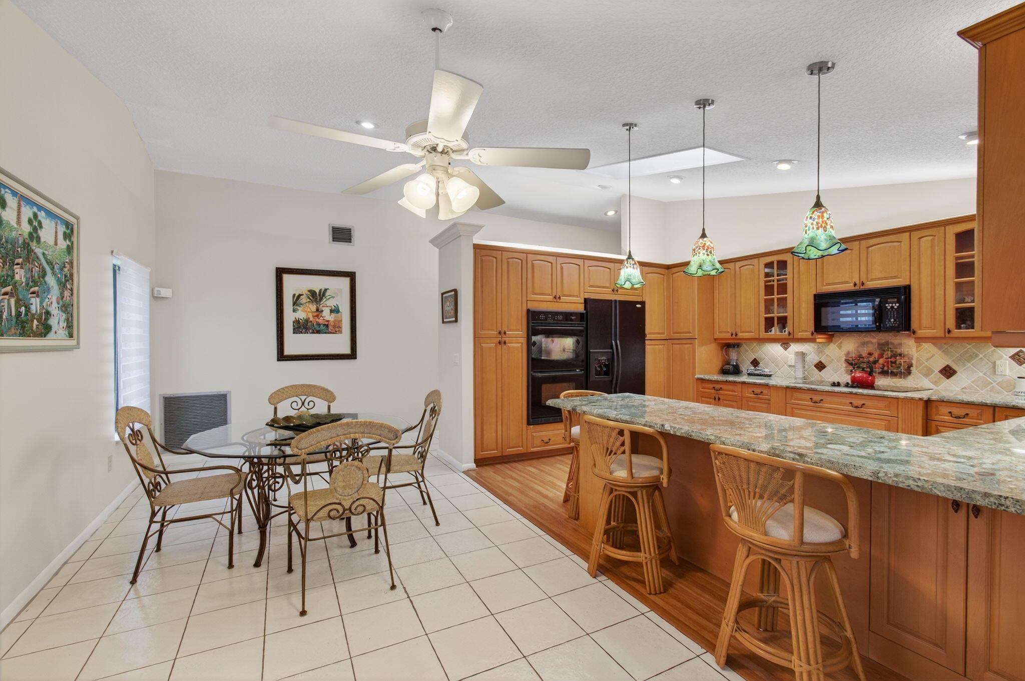 RAINBERRY BAY - ACTIVE ADULT COMMUNITY FOR 55+ AGE GROUPSEASONAL RENTAL!Welcome to 2925 Riviera Drive. Situated in the picturesque neighborhood of Rainberry Bay in Delray Beach, Florida, this home is a rare find. Acquire this expansive single-family abode on an oversized cul-de-sac lot in the coveted Estates section. Embrace the opportunity to spend winter months basking under Florida's glorious sunshine, as this home comes fully furnished and ready for you to make it your own.This captivating property is built on over 2,556 square feet of living area - a generous space for a home designed for comfort and convenience. Inside, you're welcomed through grandiose double doors into a distinctive foyer, glowing under the light of two trendy skylights.